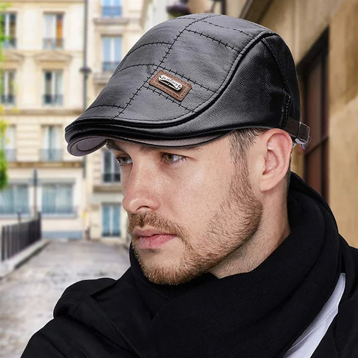 Model wearing a black faux leather beret cap, showcasing its stylish fit and vintage aesthetic.