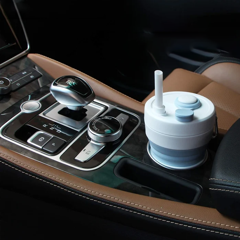 Unisex pink silicone travel bottle, reusable and BPA-free, perfect for on-the-go hydration