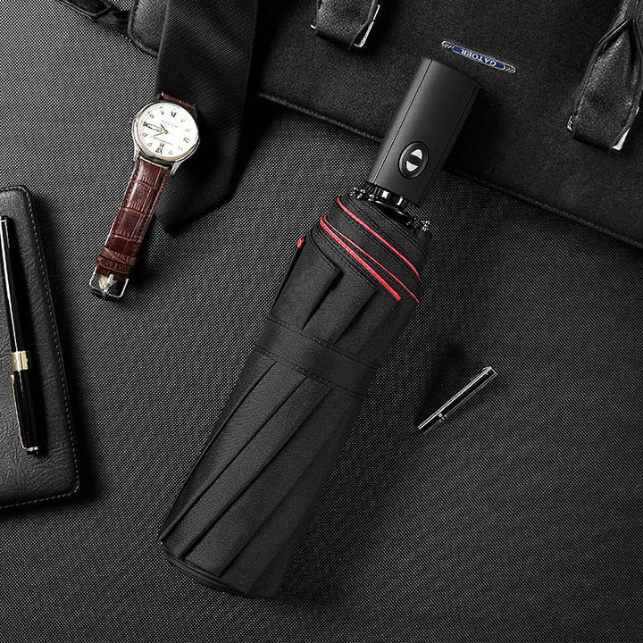 Lightweight compact travel umbrella. Unisex, automatic, and windproof for durable weather protection anywhere.