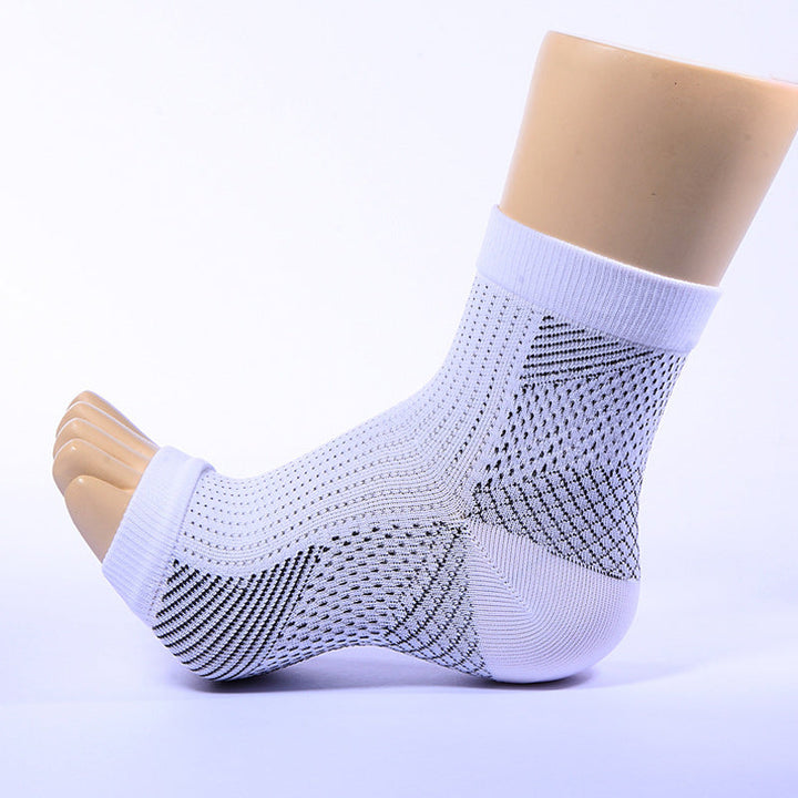 A stack of folded Unisex Compression Foot Relief Socks in various colors, for pain and circulation