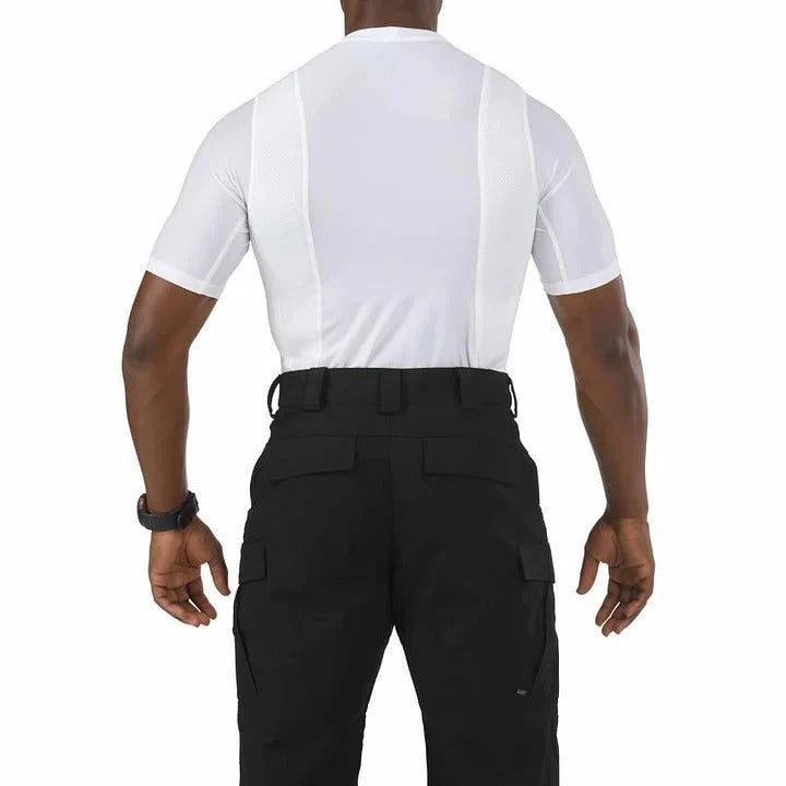 Utility holster shirt, a unisex compression tee with dual holsters for tactical concealed carry.