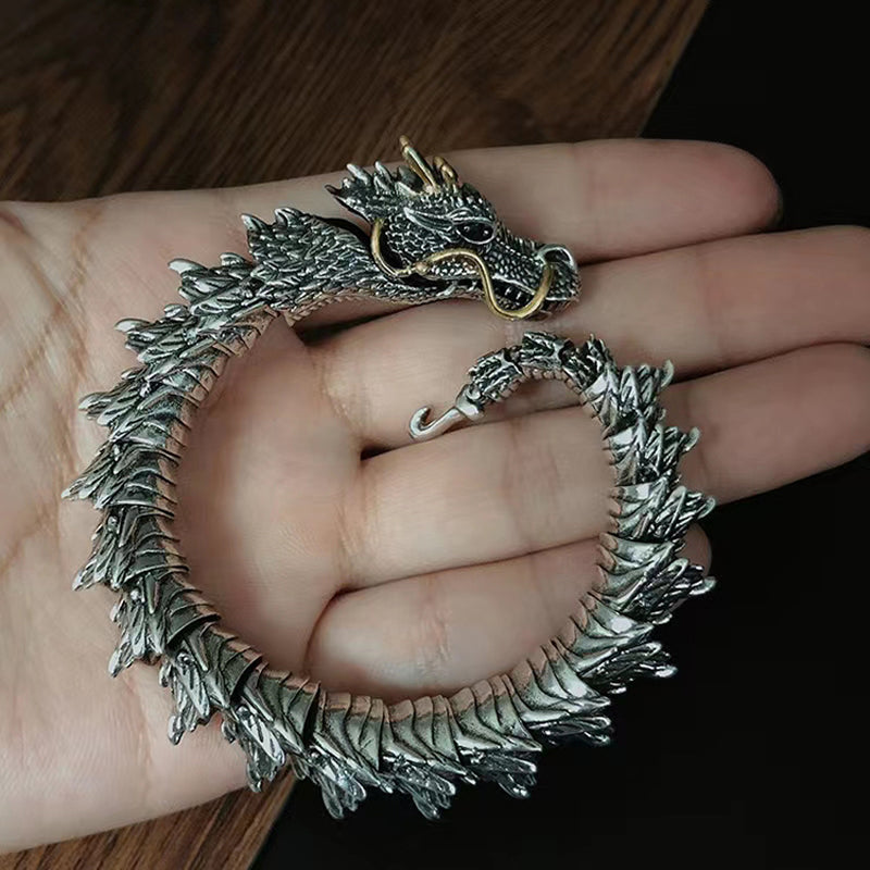 Unisex copper bracelet with intertwined dragon links, vintage aesthetic, good luck charm