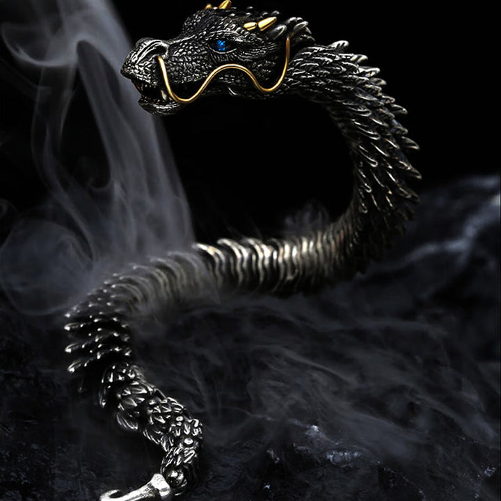 Fashion shot of a person wearing a copper dragon chain bracelet, timeless style
