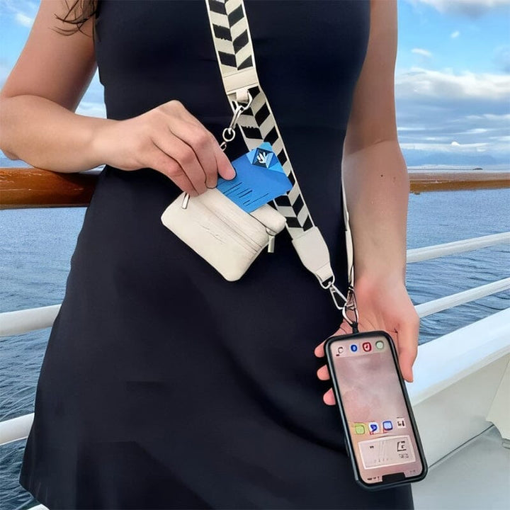 Crossbody phone strap with zipper pouch, providing a stylish and practical way to carry your phone.