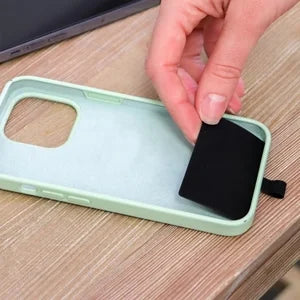 Black crossbody phone strap, a universal phone holder with an integrated zipper pouch for convenience.