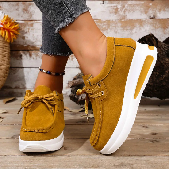 Unisex Orthopedic Walking Shoes worn during an outdoor walk on a paved path, showcasing functionality