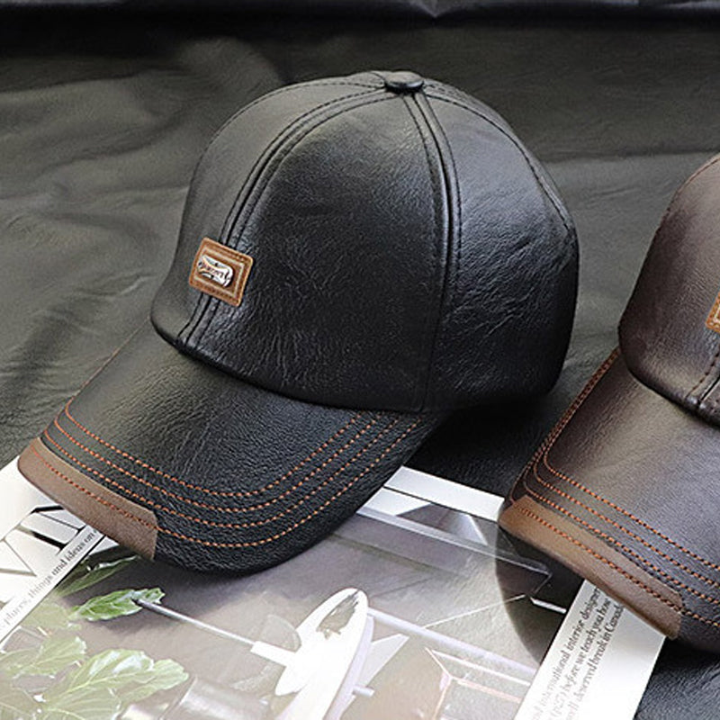 Side view of the light brown PU leather baseball cap, showcasing its adjustable strap