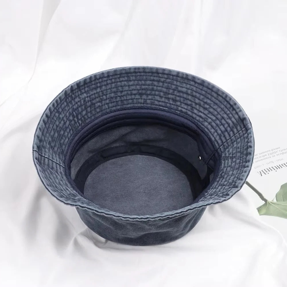 Casual denim bucket hat, a versatile fashion accessory for any look.