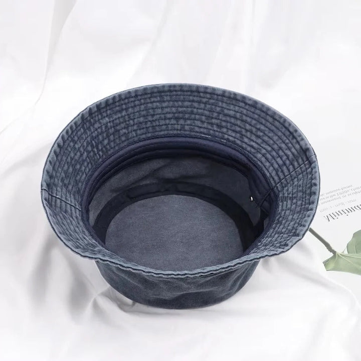 Casual denim bucket hat, a versatile fashion accessory for any look.