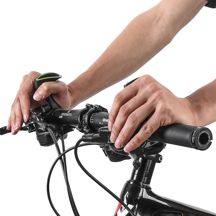 Ergonomic bike grips compatible with road, mountain, & city bikes. Non-slip for better control.