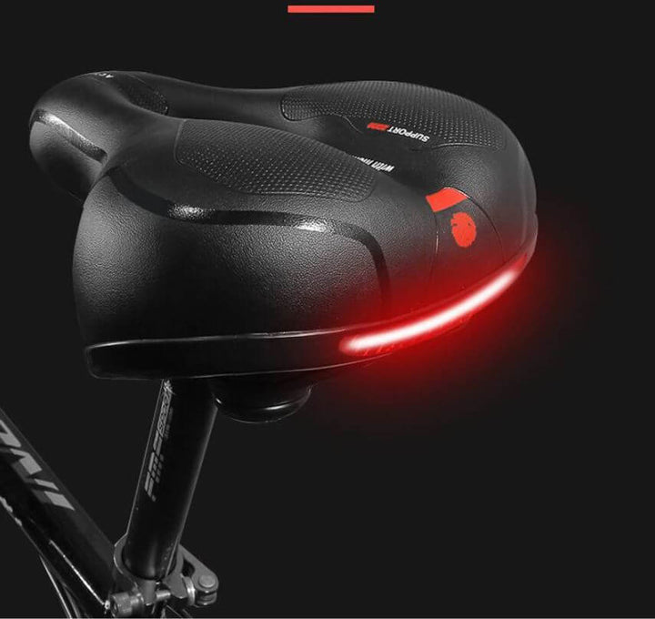 Comfortable cycling seat for long rides, offering sit bone & back pain relief. Shock absorbing, ergonomic bike saddle.