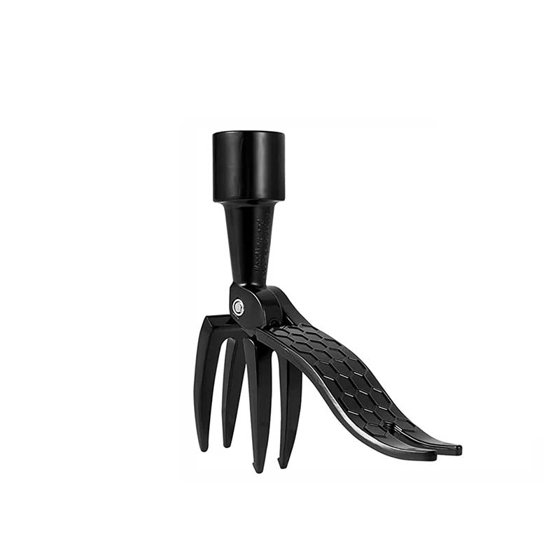 Hand holding the ergonomic grip of the detachable weed puller, emphasizing user comfort