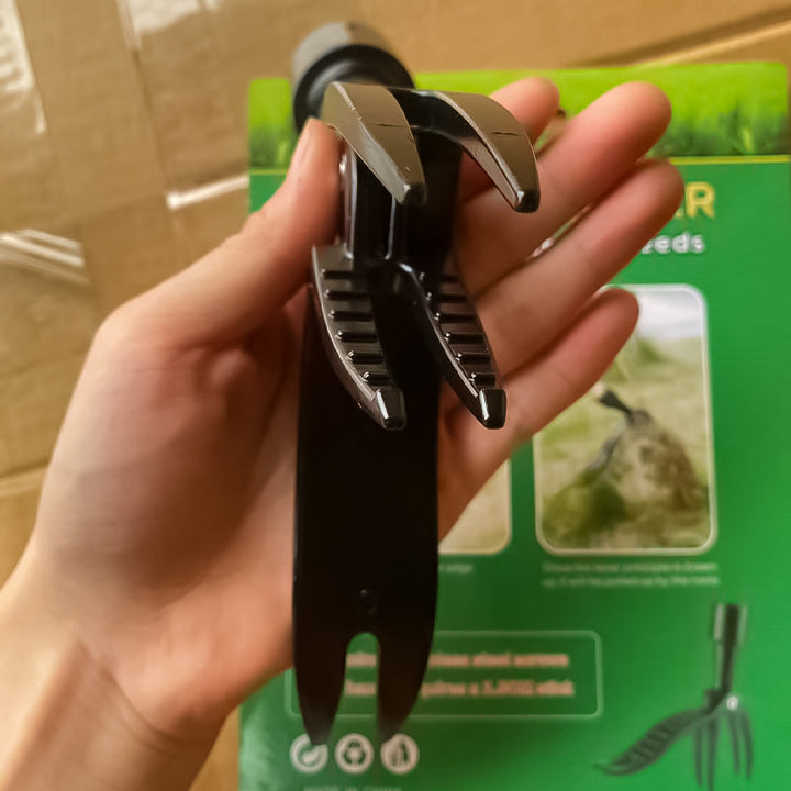 A collection of pulled weeds next to the efficient ergonomic detachable weed puller tool