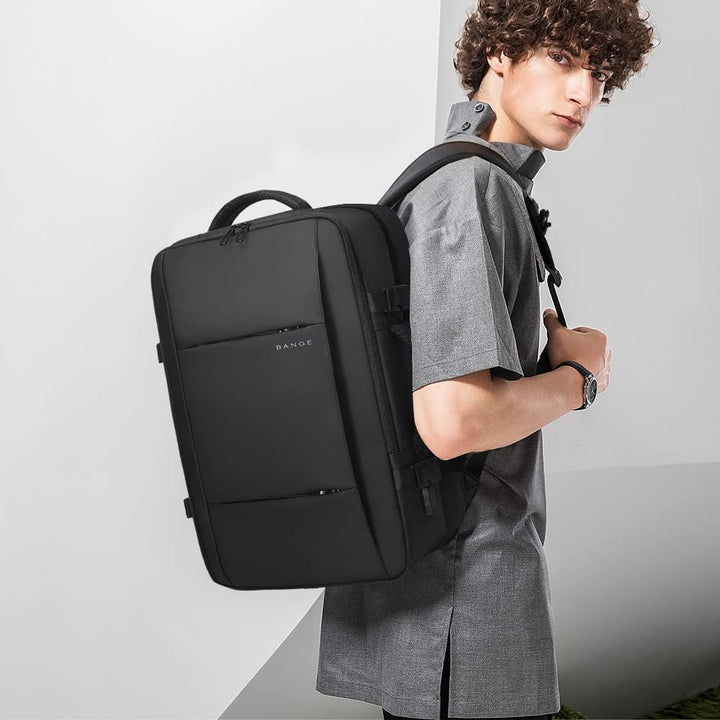 Anti-theft expandable backpack with laptop compartment, great for commuters & students.
