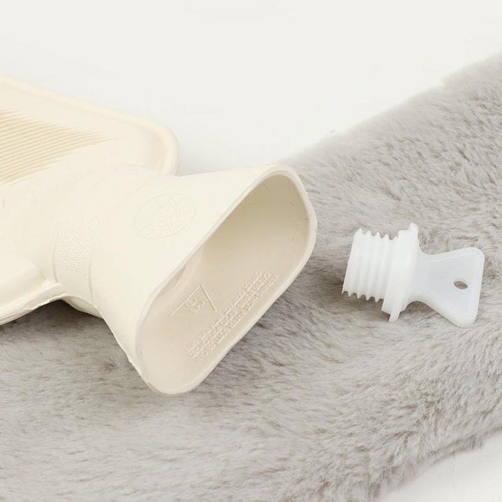 Soft-covered long hot water bottle, essential home comfort, excellent for soothing aches and pains