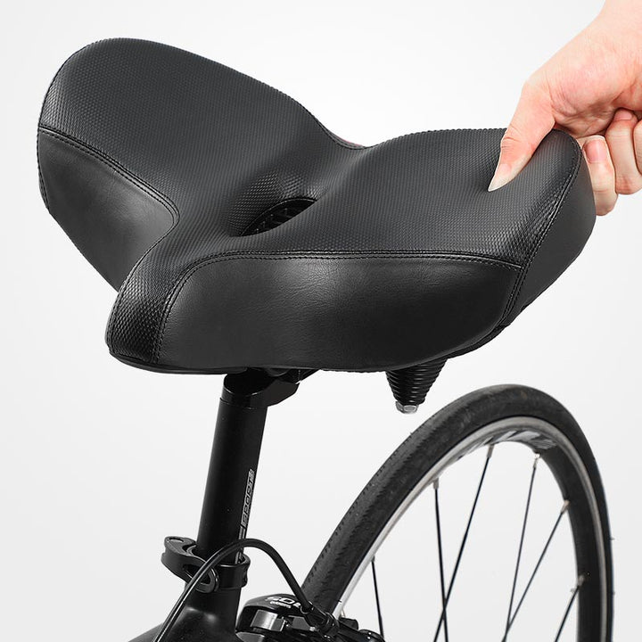 New unisex bicycle saddle, extra-wide & shock-absorbing. Perfect for comfortable cycling on any terrain.