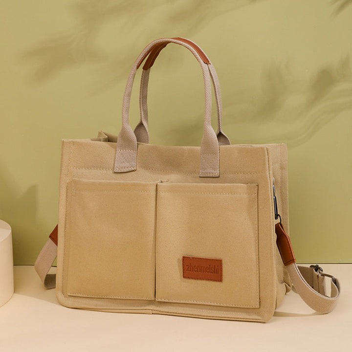 Unisex shoulder bag with multiple compartments, an organized solution for your belongings.