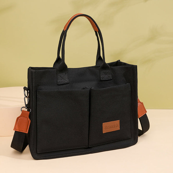 Fashion canvas crossbody bag, a timeless accessory that complements any casual outfit.