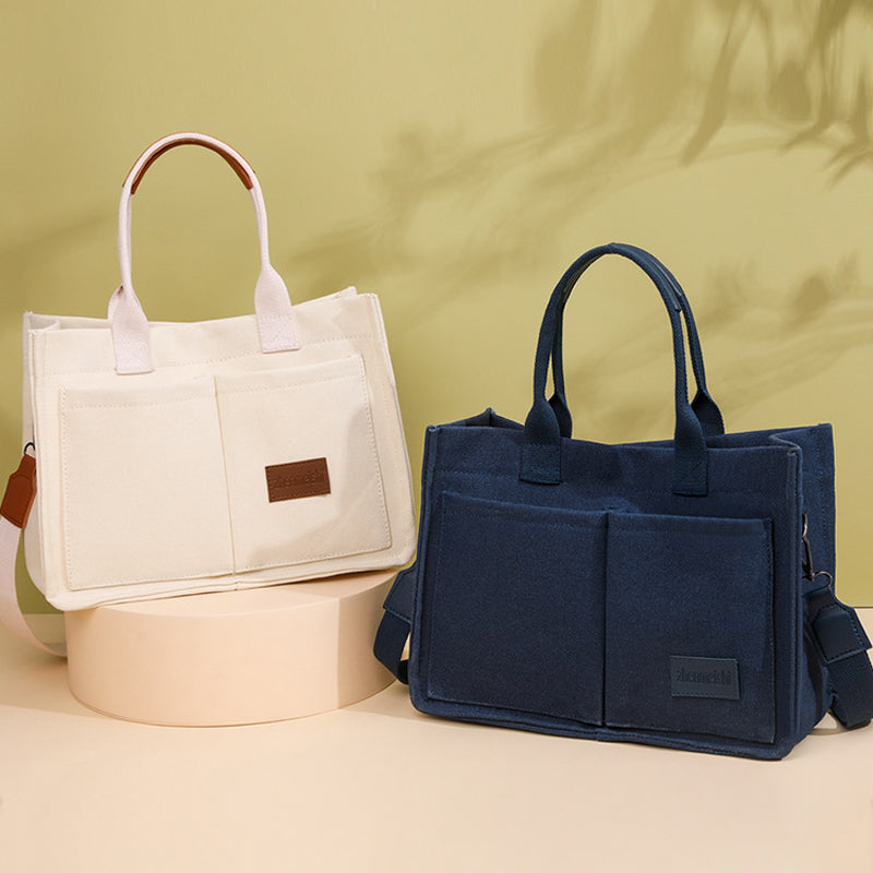 Durable unisex bag for daily use, designed with a comfortable canvas material and adjustable strap.