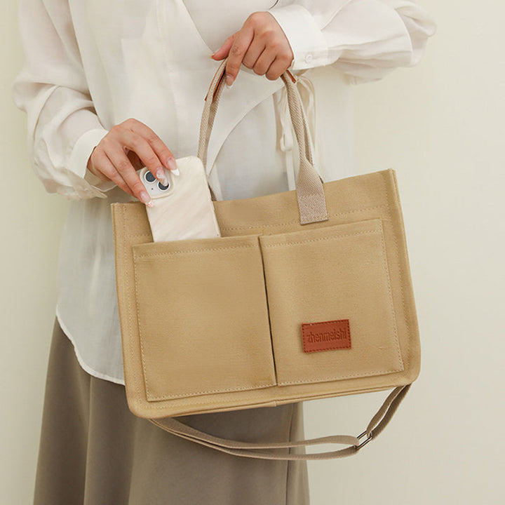 Durable canvas crossbody bag, a versatile fashion accessory suitable for all genders.