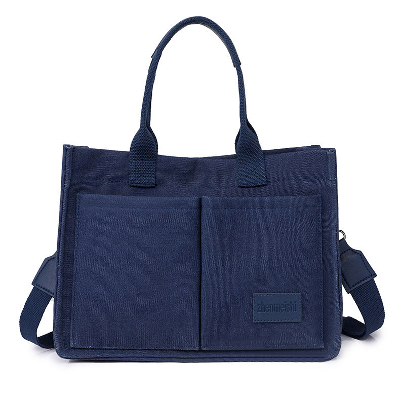 Unisex casual bag crafted from rugged canvas, built to last and suitable for any outing.