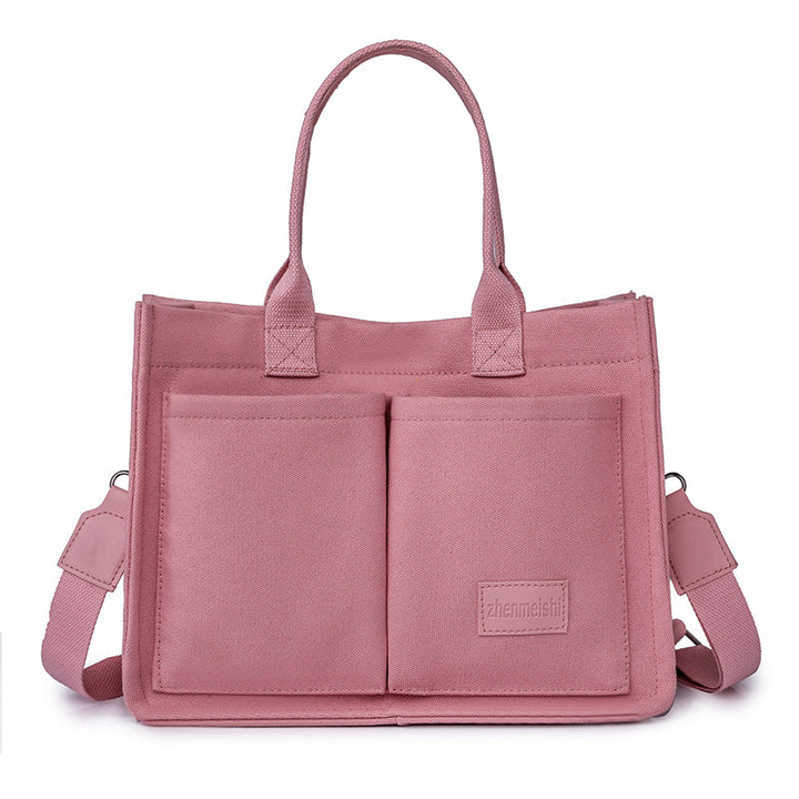 Unisex fashion canvas crossbody bag, featuring a classic design for long-lasting appeal.