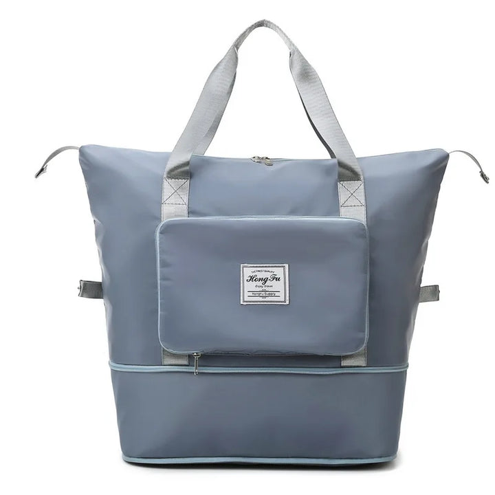 Unisex foldable travel duffel bag, unfolded, ready for space-saving carry-on travel. Perfect weekend bag.