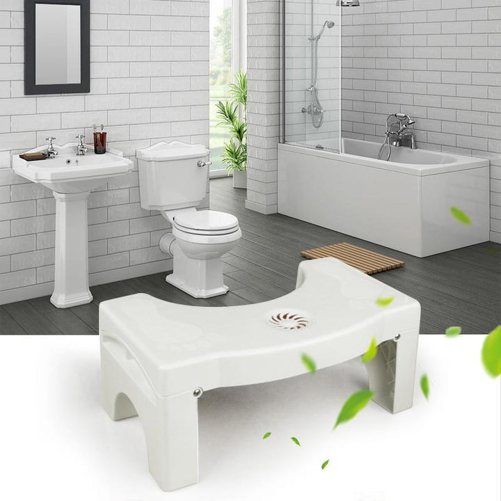 Unisex houseware: white folding toilet squatting stool for natural, healthy toileting and easy storage.