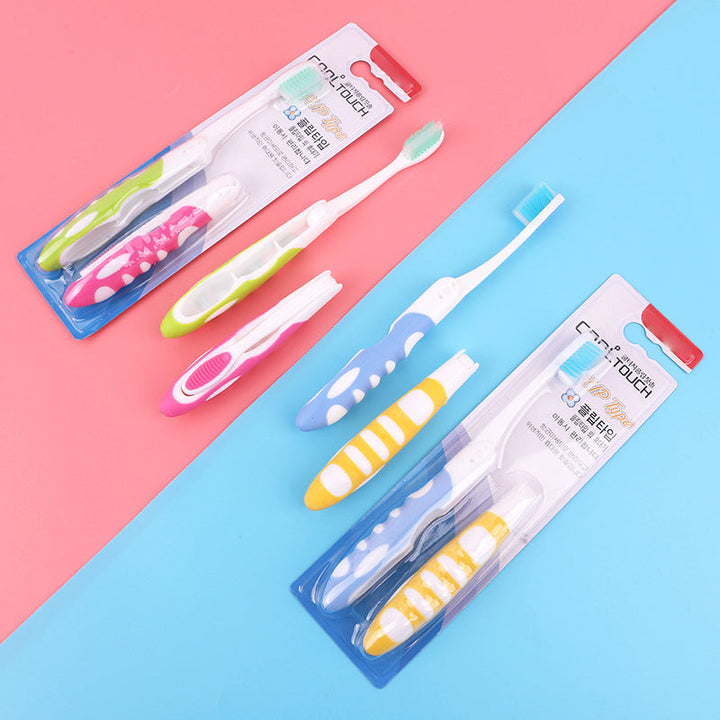 Portable folding toothbrush, white bristles, ideal for travel hygiene and oral care