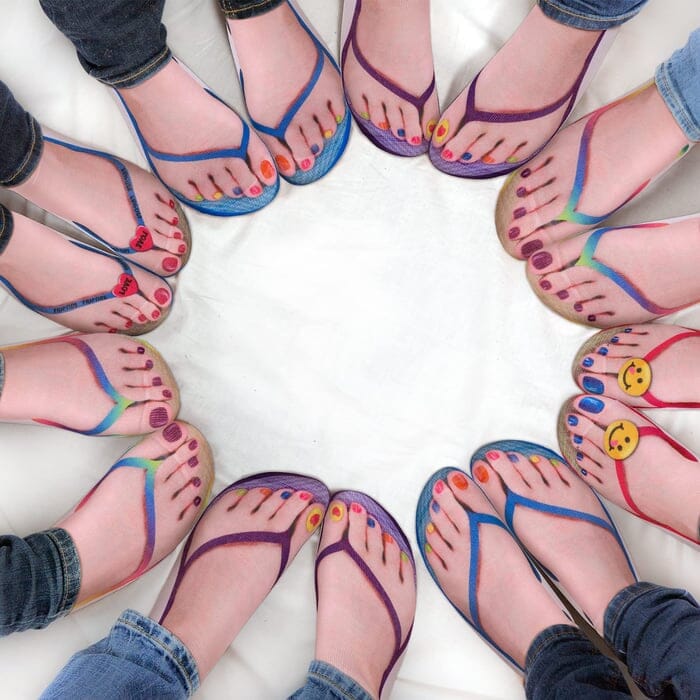 Model wearing multi-colored novelty 3D print ankle socks, showcasing their fun and vibrant design