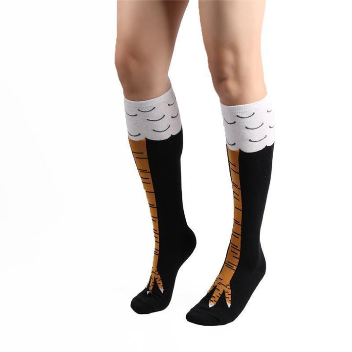 Close-up of funny chicken leg socks, highlighting the realistic drumstick design and comfortable fabric.