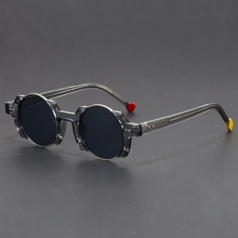 Close-up of unisex futuristic round frame sunglasses, showcasing the unique design and dark UV protective lenses.