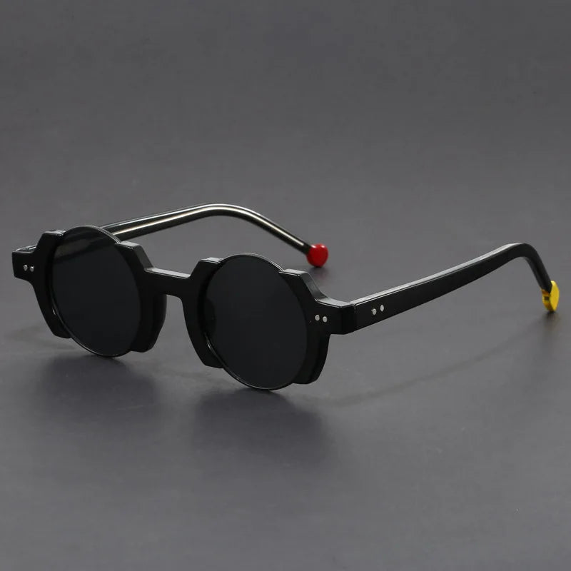 Side view of unisex futuristic round frame sunglasses, highlighting the distinct temple design and dark lenses.