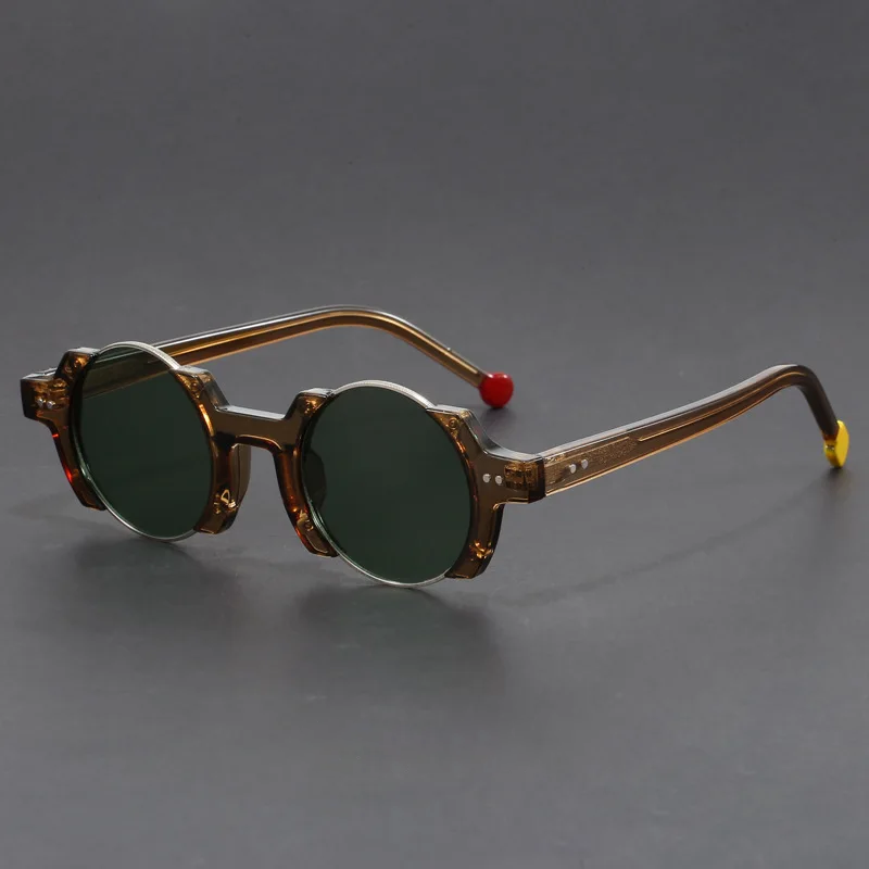 Overhead shot of unisex futuristic round frame sunglasses, emphasizing their symmetrical and modern aesthetic.