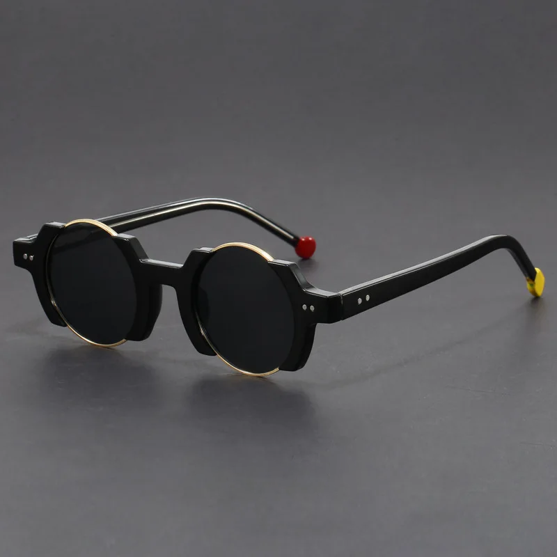 Detail shot of the hinge on unisex futuristic round frame sunglasses, showcasing quality craftsmanship.
