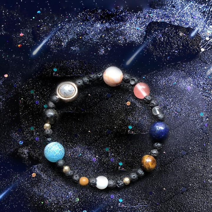 Unisex gemstone solar system bracelet featuring natural stone planets, a unique celestial fashion accessory.