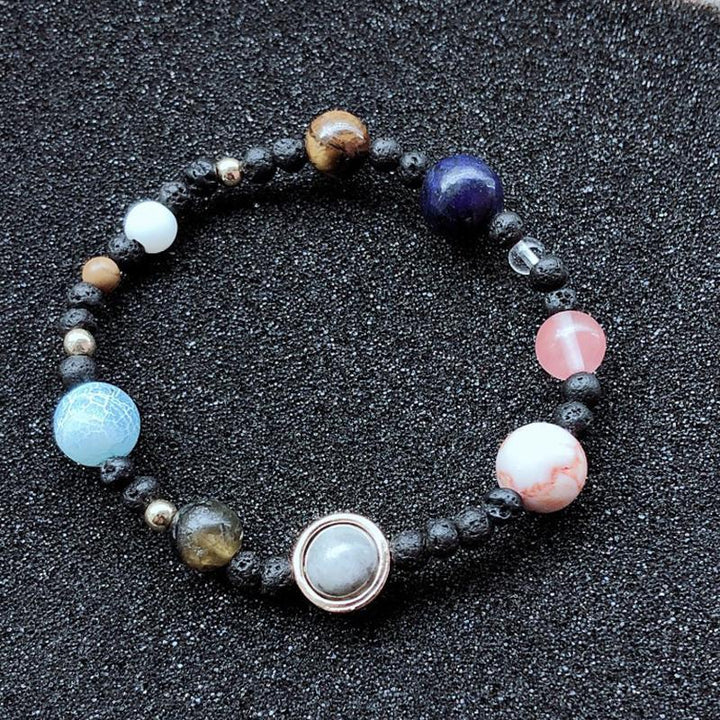 Gift idea: Unisex natural gemstone solar system bracelet, a beautiful and meaningful celestial accessory.