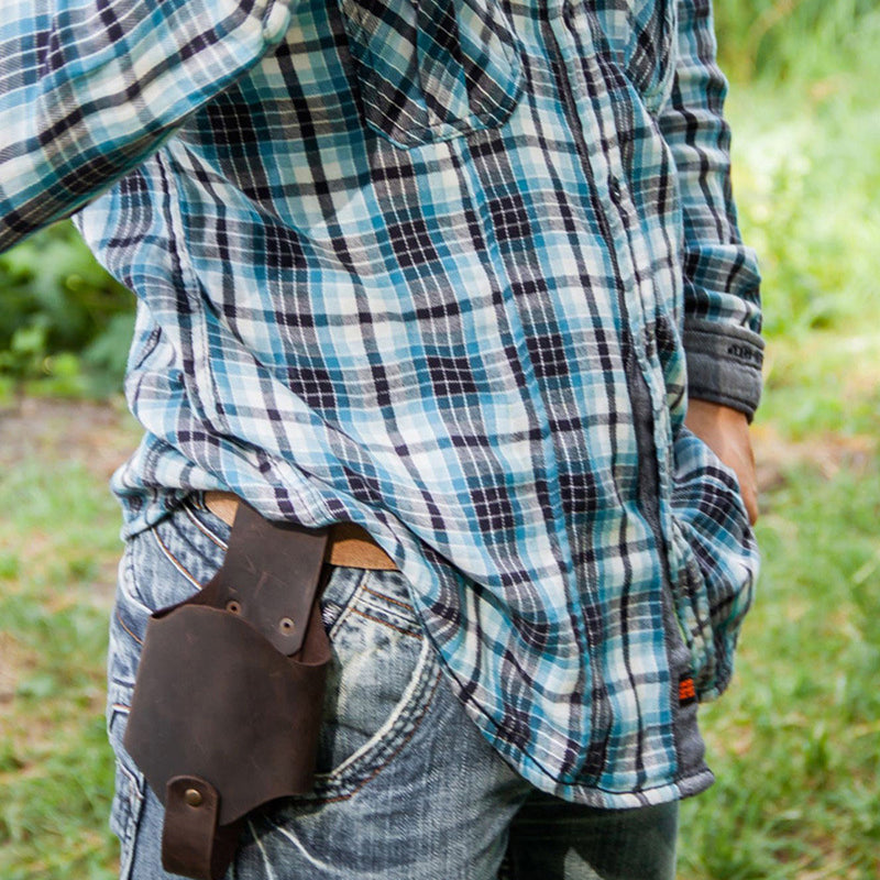 A hands-free leather drink holder securely attached to a belt, a unique and practical gift idea