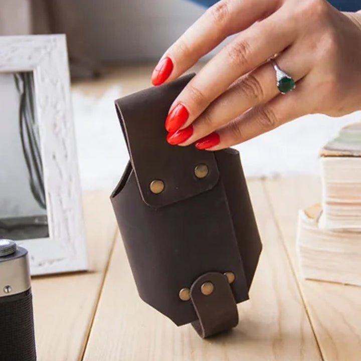Side view of a handcrafted leather belt drink holder, showcasing its quality and design