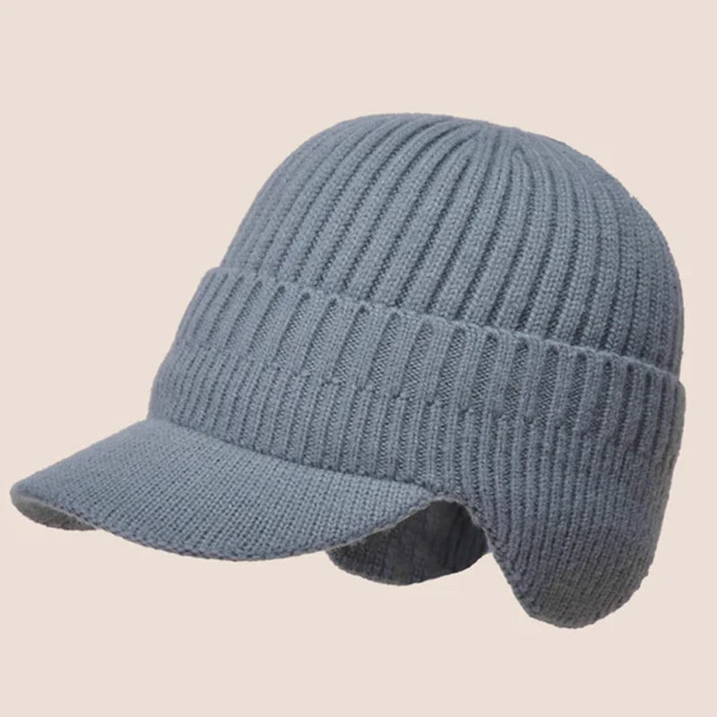 Unisex black knitted beanie, a warm and protective winter hat with ear flaps.