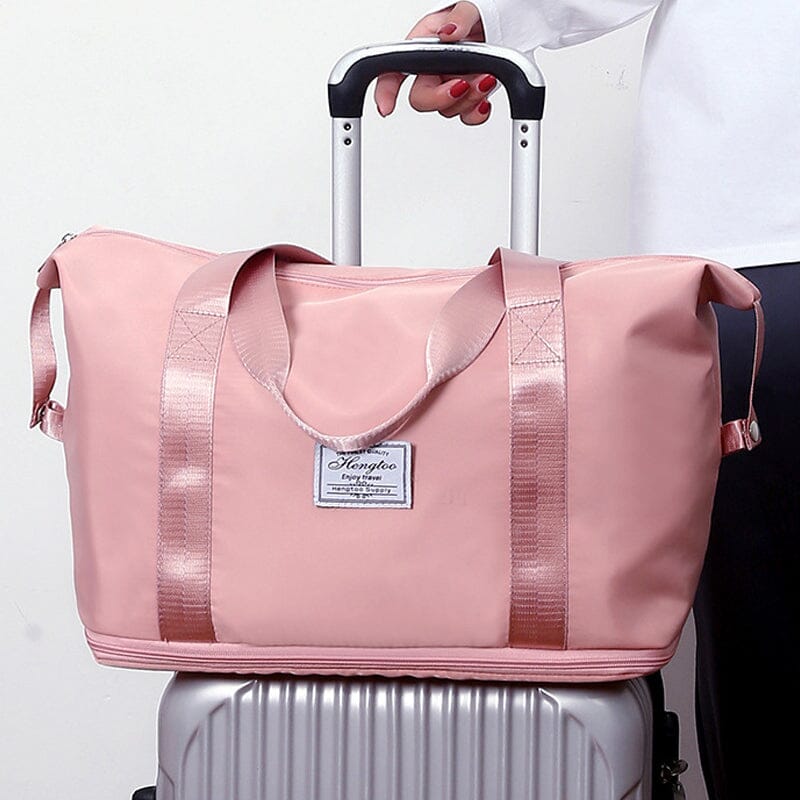 Large capacity unisex duffel bag for travel, featuring wet and dry separation, carry-on size