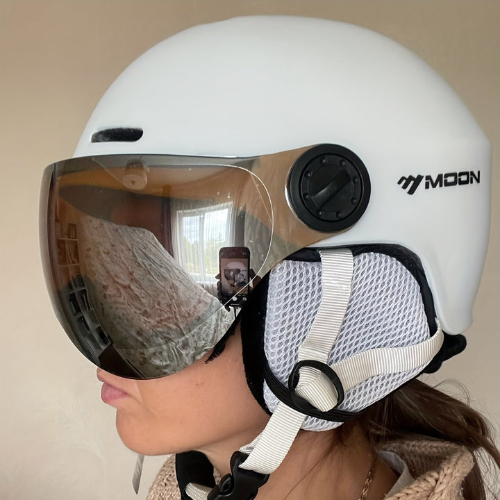 Winter sports essential: grey ski helmet with durable shell & soft lining for comfort & protection.