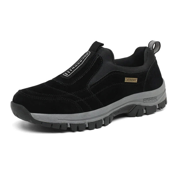 Comfortable unisex hiking footwear with orthopedic support, perfect for long walks & outdoor activities.