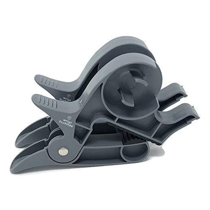 Multiple components of the Holiday Gift Wrapping Tool Set laid out, emphasizing the tape dispenser