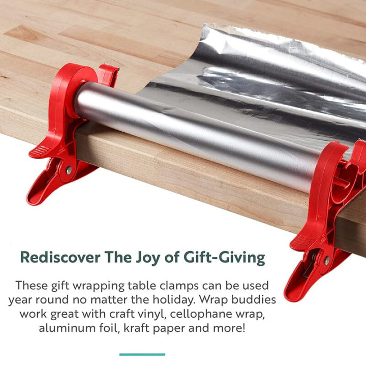 Gift wrapping tool set clamped to a table, showcasing its stability and the accessible tape dispenser
