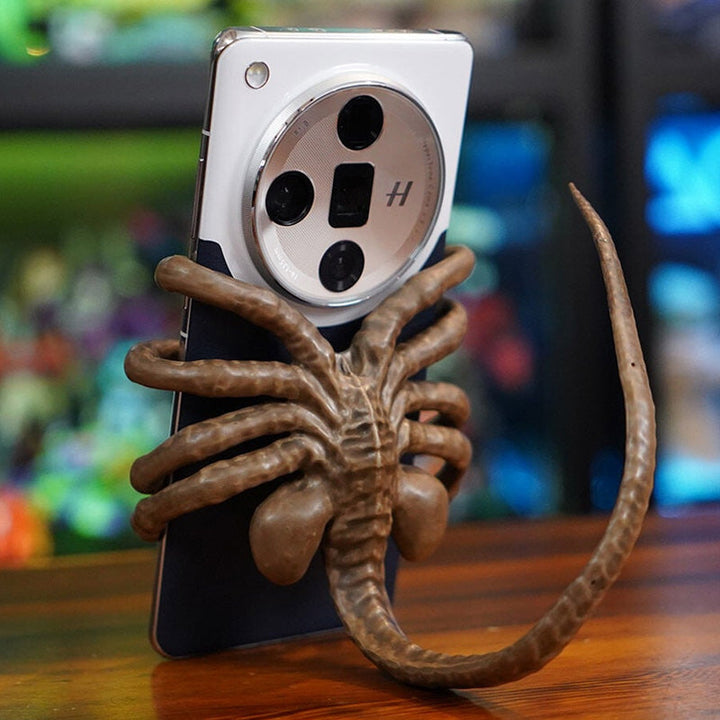Close-up of the Horrible Creature Phone Holder Stand's detailed, monstrous resin face.