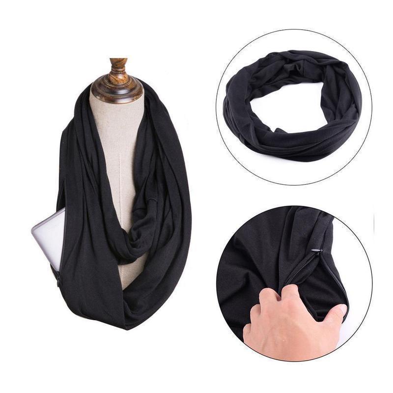 Fashionable infinity scarf in black and gold chain print, perfect for travel.