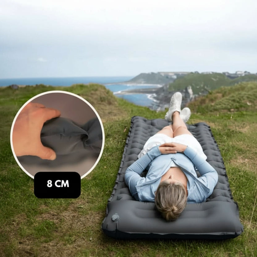 Easy-to-inflate camping mattress with built-in foot pump. Perfect for quick setup and comfortable outdoor sleeping.