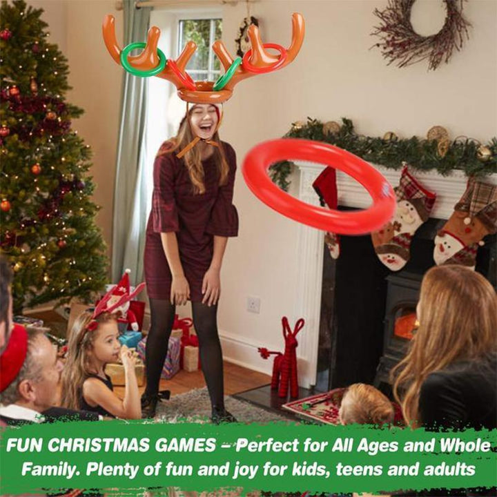 Adults enjoying inflatable reindeer ring toss, fun party game with antlers and rings