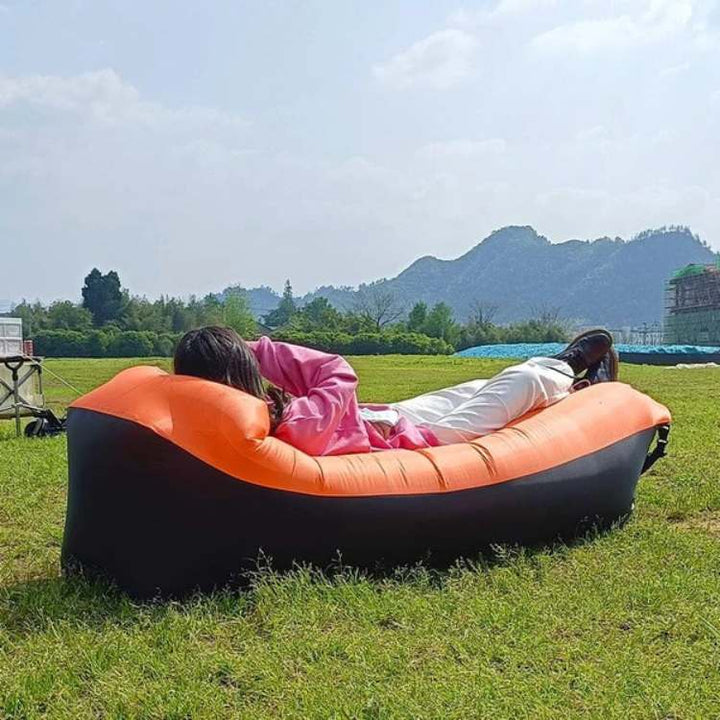 Versatile inflatable sofa bed for men & women. Lightweight design for indoor, outdoor, camping & beach.